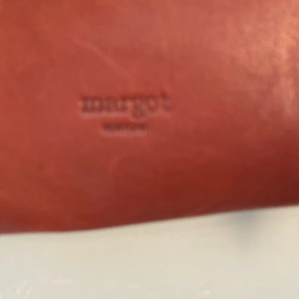 Margot Rob fold over Crossbody clutch